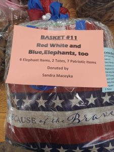 2 totes,several elephant items, several patriotic items